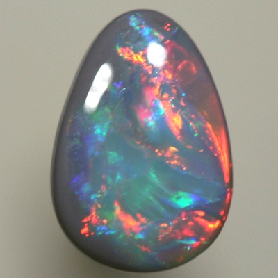 SOLID BLACK OPAL Very bright cherry reds move all over the face of the opal SEE VIDEO